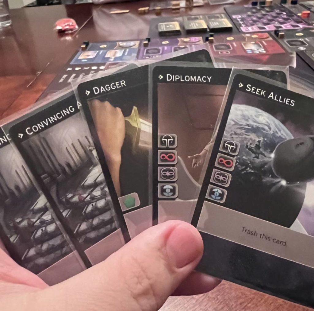 A hand of cards in Dune Imperium
